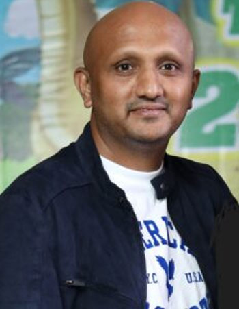 Dr. SURAJ